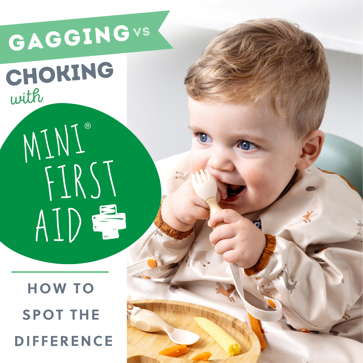 Happy baby in a beige bib, holding a fork, with food on a bamboo plate.