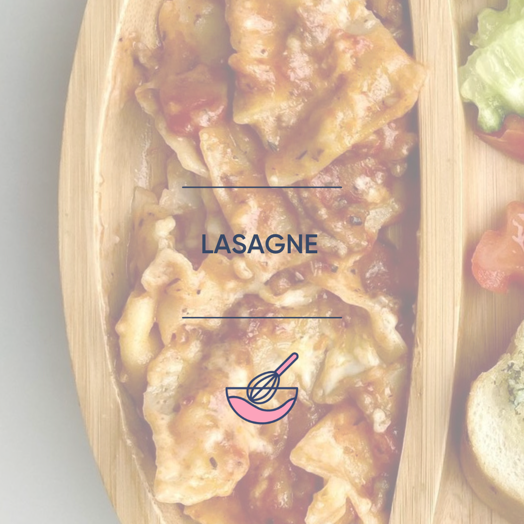Golden-brown lasagne with rich tomato sauce in a wooden dish, served with a side salad.