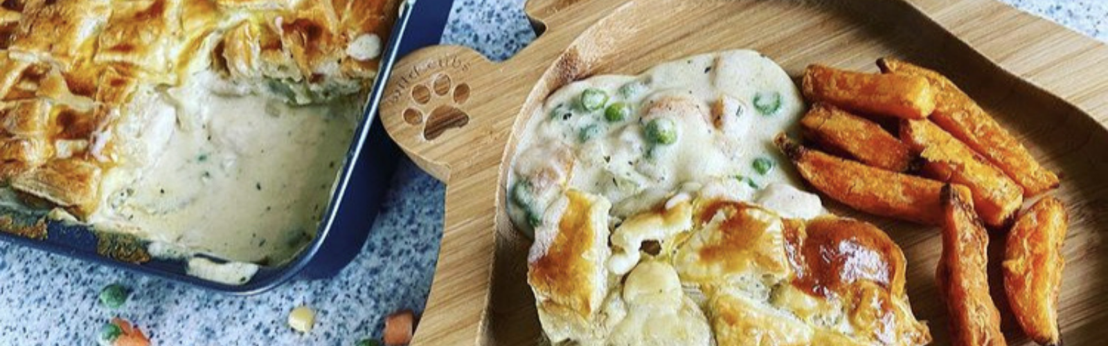 Golden chicken and vegetable pie with flaky pastry, served with sweet potato chips.
