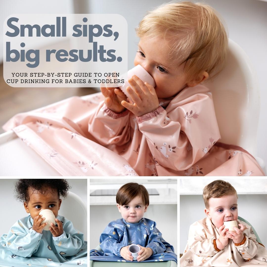 Babies and toddlers in long-sleeved bibs learning to drink from small open cups.