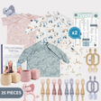 Twin Bears weaning bundle with pink floral, blue dinosaur, and construction bibs, cups, cutlery, teethers, and charts.