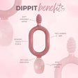 Pink silicone Dippit baby spoon and textured dipper with two-handed grip, sensory points, and anti-gag wide neck.