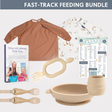 Fast Track Feeding Bundle: terracotta rainbow smock, safari bib, beige silicone bowl, cup, fork, spoon, teether, and weaning chart.