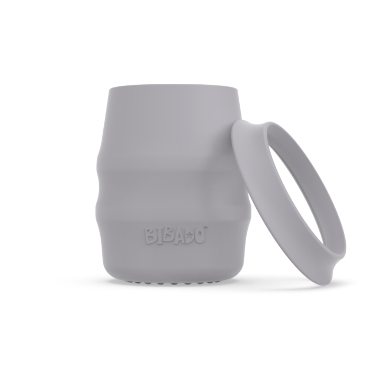 A light blue-grey silicone baby drinking cup with a removable silicone skirted base propped against it, shown on a clean white background.  - Product image